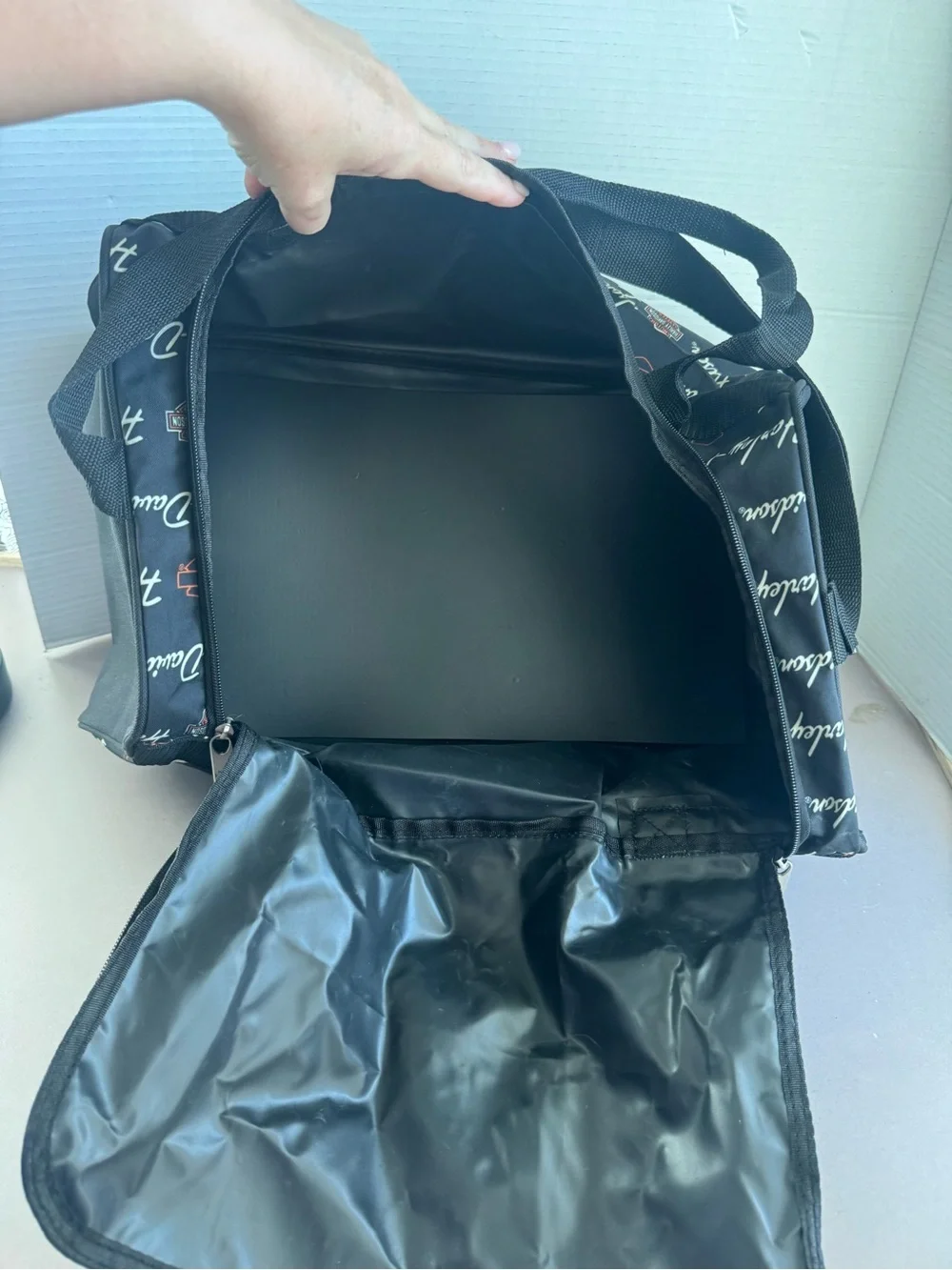 Harley-Davidson Black Duffel with White Script and Orange Accents